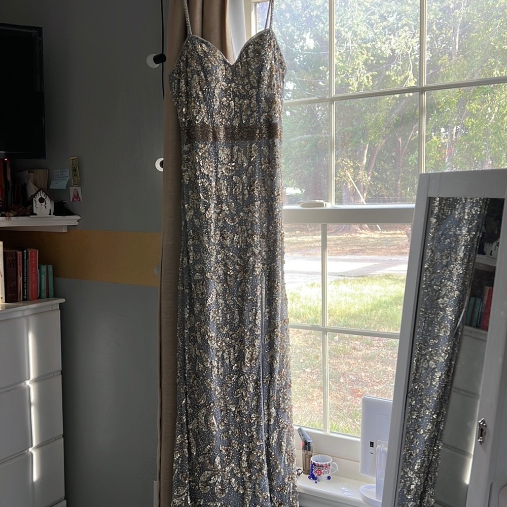 Mac Duggal blue beaded gown with cut on thigh